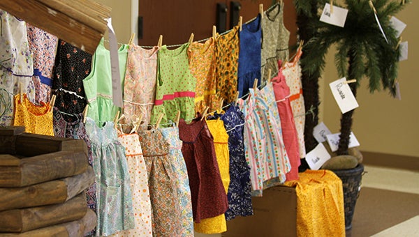 A Courtland Baptist Church group has stitched together 117 dresses for Rwandan HUGS, a non-profit put together by Nancy Strachan, a Southampton County native. Strachan started this organization in 2010 aiming at providing relief to people in the country recovering from 1994’s genocide. -- CAIN MADDEN | TIDEWATER NEWS