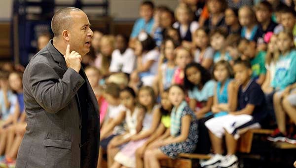 Headmaster Scott Wasdin talks to the students at the assembly on the first day of school at Southampton Academy. Wasdin said if he hears anything about bullying, that the offenders would have to report to him. -- CAIN MADDEN | TIDEWATER NEWS