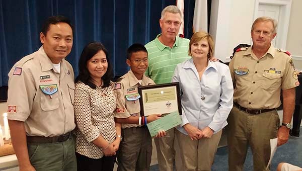 During a Court of Honor on Tuesday in High Street United Methodist Church, Troop 17 Boy Scout Anthony Ona, third from left, received the Jackson Clarke Fox Merit Badge Achievement Award. With him from left are his parents, Alex and Maria Ona, the sponsoring family, Clarke and Beth Fox, and Harold Burkett, who presented the award. -- Submitted