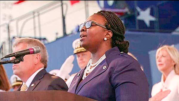 Ashley Bryant of Courtland singing the National Anthem at the Newport News Shipyard for the christening of the USS John Warner. -- SUBMITTED
