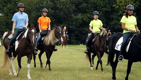 Riders and their horses move out to the trails at Raccoon Creek Sports LLC in Sebrell. On Saturday and Sunday they participated in the annual Saddle Up for St. Jude, which raises money for the research hospital. St. Jude’s is devoted to finding the causes of and treatments for childhood cancer and other serious illnesses. -- Stephen H. Cowles | The Tidewater News