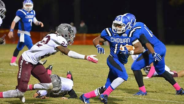 Anthony Clanton tries his best to avert a tackle in order gain some Chowan yardage. — Jim Hart | Tidewater News