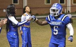 J.R. Williams gives the Chowan cheerleaders a fist bump in celebration of his touchdown. -- Jim Hart | Tidewater News