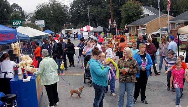A crowd of approximately 2,000 braved the overcast day to visit the Boykins Pumpkin Festival in 2013. -- FILE PHOTO