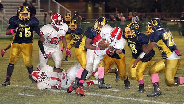 Bronco defense digs in to stop Sussex running back. FRANK A. DAVIS | TIDEWATER NEWS