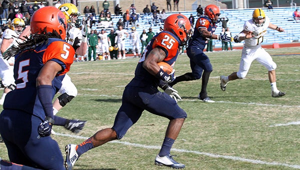Andre Rawls picks off Steven Laurino’s pass in the 2nd quarter and returns it 83 yards for what would be the go ahead score for the VSU Trojans as they went on to defeat LIU-Post 28-17. -- Frank Davis | Tidewater News