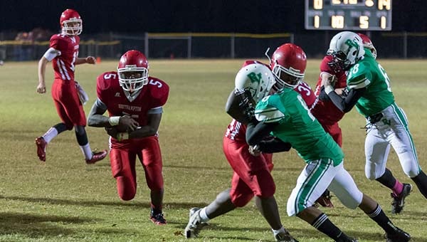 Coby Williams finds an opening up the gut for a touchdown. -- MURRAY THOMPSON  | The Tidewater News
