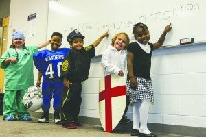 From left, our nurse, Brooklyn Stallings of Isle of Wight Academy; our professional football player, Ethan Hatch of Southampton Academy; our police officer, Timothy Martinez of Windsor Elementary; our knight, Jackson Nicholson of Meherrin Elementary; and our teacher, Jakylah Diggs of S.P. Morton Elementary. Photo by Cain Madden.