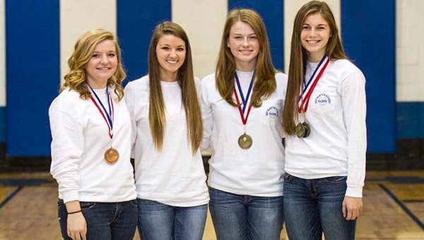 Four Southampton Academy Lady Raiders took home VISAA Virginia Commonweath Conference Awards. From left, Morgan Garris, Haley Drewry, Allison Matthews and Mason Pope. -- Cain Madden | Tidewater News