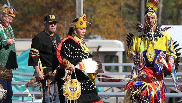 Head Female and Male Dancers Tina and Osceola Millin of the Lumbee tribe, lead the Intertribal dance during a ceremony honoring the veterans in attendance. Cain Madden | Tidewater News