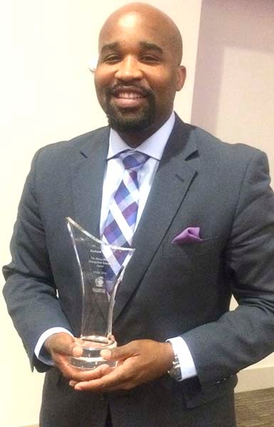 Rashard Wright, the executive director of K-12 schools and leadership development in the Isle of Wight County Schools system, holds the National Marcus Foster Distinguished Educator Award. This was presented to him last Friday by the National Alliance of Black School Educators during the convention in Kansas City, Missouri. -- SUBMITTED