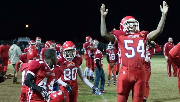 The Southampton Indians celebrate after the 36-32 defeat of the rival Franklin Broncos. -- MURRAY THOMPSON  | THE TIDEWATER NEWS