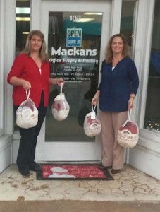 Mackans gave away free turkeys recently to businesses and customers. -- SUBMITTED