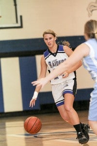 Point guard Sarah Best works the ball up the court in a game earlier this season. The Southampton Academy Lady Raiders are on a three game winning streak, and during that stretch Best is averaging 16 points per game. -- Cain Madden | Tidewater News