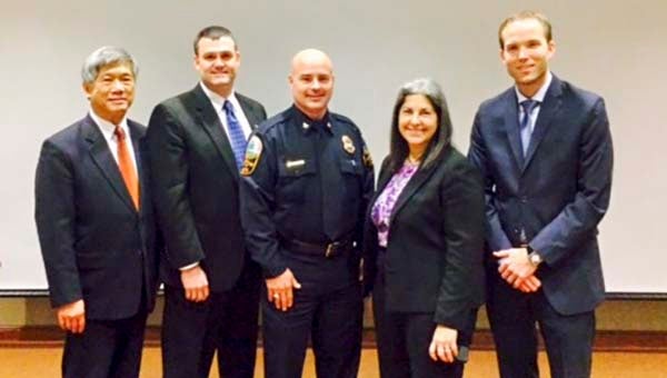 Franklin and Smithfield recently hosted a two-day program by the Department of Justice and the FBI. From left, Ben Lieu, associate director of operations for the DOJ’s Community Relation Serivce; Brian Grehoski, a supervisory special agent within the Civil Rights Unit of the FBI; Franklin Police Chief Phil Hardison; Jessica Ginsburg, who serves in the Civil Rights Division of DOJ; and Michael J. Songer, a trial attorney in the Civil Rights Division of the Justice department. -- SUBMITTED