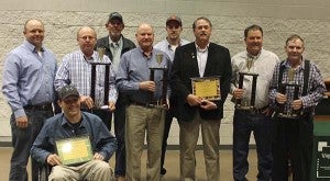 The top five peanut producers of 2014 in Southampton County are, at left, Matt Drake, Jason Drake (seated) and Pumpkin Drake, Bobby Porter, Jeff Davis, Sonny Davis and Ray Davis, Joey Johnson and Earl Johnson. -- SUBMITTED