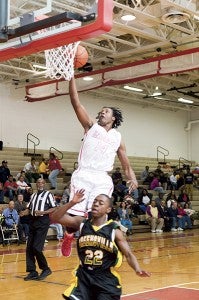 Cedric Parham goes up for a layup. -- Murray Thompson | Tidewater News
