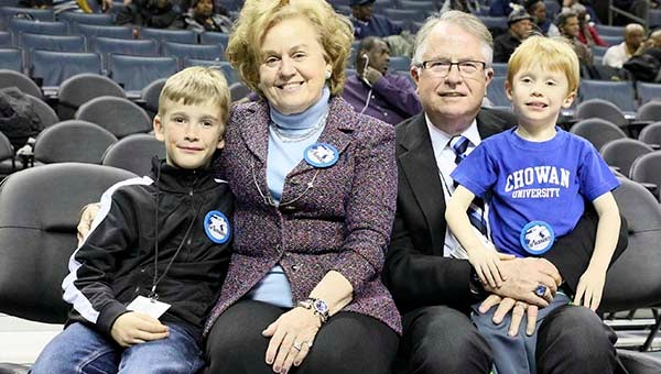 The first family of Chowan University and grandsons were courtside for the CIAA Basketball Tournament. From left to right, grandson Cameron White,  Linda White, Dr. M. Christopher White and grandson Cardin White. Cameron and Cardin’s parents are Marty and Dr. Heather White of Charlotte, North Carolina; they attend Charlotte Christian Academy. -- Frank Davis | Tidewater News