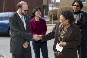 Del. Roslyn Tyler shakes the hand of Tim Bradshaw. -- Cain Madden | Tidewater News