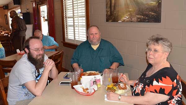 Friends from Franklin making the trip to Whitley’s to see the new décor were, from left, Justin Luck, Cary Kirkland and Kathy Worrell. 