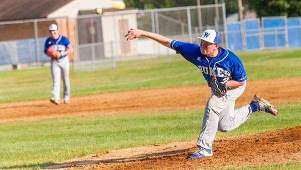 Alec Kiser pitches earlier this season against Franklin. He and Southampton’s Hunter Peck had a pitcher’s duel going in which Peck came out on top. -- Cain Madden | Tidewater News