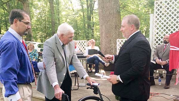 Michael Mahanes leads R.T. Lassiter to receive a certificate of recognition for his Army service to country during World War II. -- STEPHEN H. COWLES | WINDSOR WEEKLY