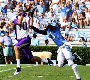 JMU receiver Daniel Brown makes his first career touchdown catch over the outstretched arms of North Carolina safety Tre Boston on Sept. 3, 2011. -- COURTESY
