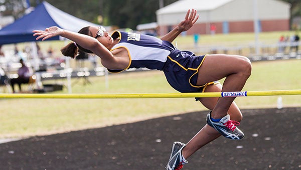 Josie Rankin clears the high jump bar. She placed first at the most recent track meet. -- Cain Madden | Tidewater News