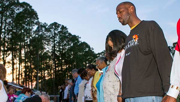 Local pastors, including the Rev. Dwight Riddick of the First Baptist Church of Franklin, are prayed for by the community on the National Day of Prayer. -- Cain Madden | Tidewater News
