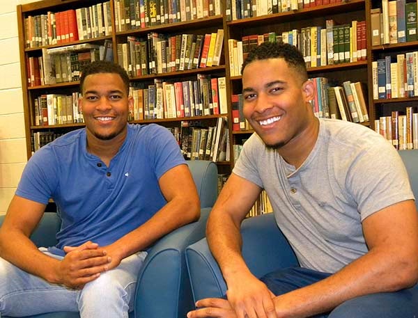Twin brothers, from left, Jalen and Justin Boone, are earning their bachelor degrees from Old Dominion Univeristy and will graduate from Paul D. Camp Community College on May 15.
