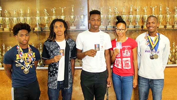Members of the Franklin High School track team pose with their medals after the State Tournament. From left, Javonte’ Baker, Gerrell Porter, Jawun Walton, Josie Rankin and Quayshaun Jefferson. -- SUBMITTED