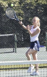 Brianna Karmilovich looks to return a volley in a match earlier this season. The school’s No. 1 player made it all the way to the semifinals of the VHSL 1A State Tournament in tennis. -- Frank Davis | Tidewater News