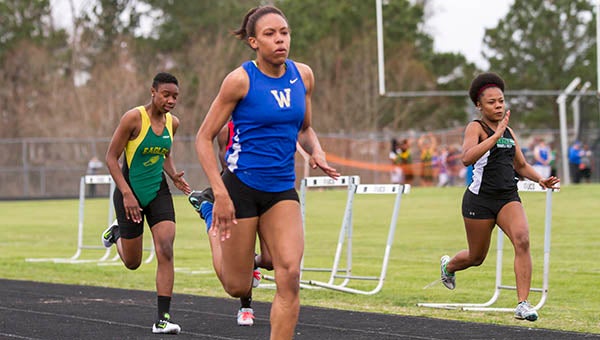 Windsor’s Vonquisha Turner speeds toward the finish line in the 100 for a first place finish earlier this season. She finished the 2A East Region Meet with a time of 13.02, which was good enough for second place and a trip to the 2A State meet. -- Cain Madden | Tidewater News