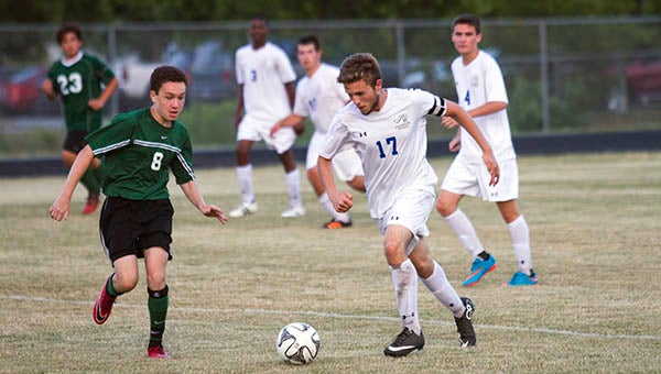 Windsor defender Austin Meier looks to get control of the ball so that he can move it back to midfield. The senior, who made the TriRiver’s District first-team, will try out for the Lynchburge College soccer team later this month. -- Cain Madden | Tidewater News