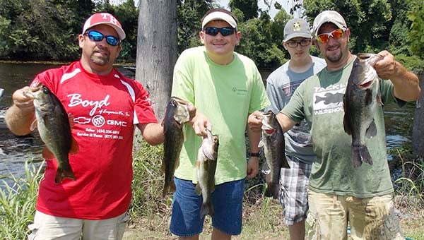 First-place winners, at left, Billy Daniels, Jorden Jarrett, Ian Wolfe and Brent Boney hold their catch of the day. -- Submitted | Alesia Williams