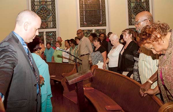 Members of local faith communities gathered at Franklin Baptist Church on Tuesday evening to offer a prayer service for Charlston following the tragedy where nine people died at Emanuel African Methodist Episcopal Church.