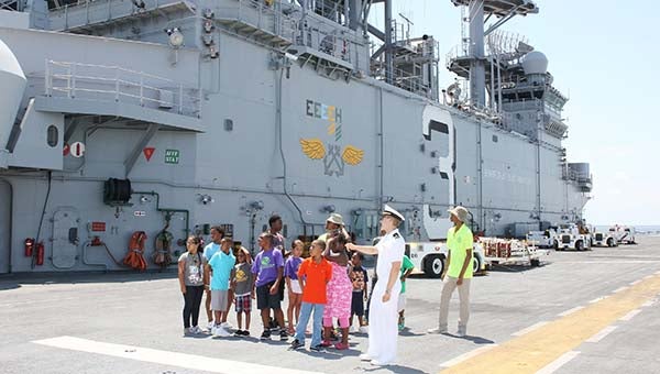 The Super Jam kids and staff get a tour at the Norfolk Naval Station. -- Frank Davis | Tidewater News
