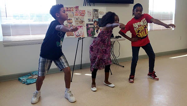 Many children who were part of the Summer Enrichment Program at the Franklin Redevelopment and Housing Authority did group dances at the closing ceremony. - Rebecca Chappell | Tidewater News