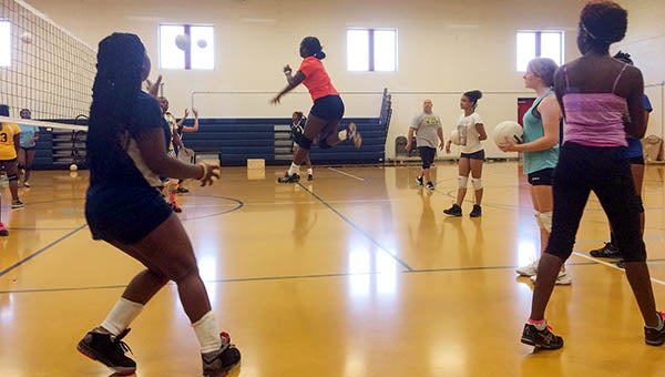FHS volleyball players practicing with each other to get ready for the upcoming season. -- Rebecca Chappell | Tidewater News