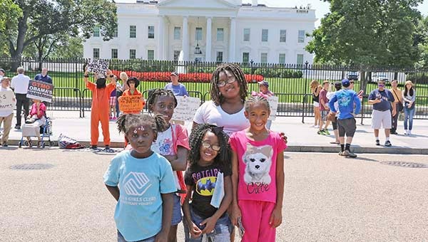 With protestors marching in front of the White House are, front row left to right, Sanaii Mason-Thomas, Jayla Johnson, Cierra Iroko; back, Aushari Barnes and Jaleesah Parker. -- Frank Davis | Tidewater News
