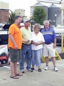 Billy and Sharon Piersa win the $1,000 grand prize at the Franklin Cruise-In Grand Finale on Saturday. Left to right; Scott Seddon, Billy Piersa, Sharon Piersa, City Manager Randy Martin -- SUBMITTED