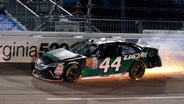 Sparks fly as David Starr (44) hits the wall hard in Turn 3 during Friday night’s XFINITY Series race at Richmond International Raceway. -- SUBMITTED | JIM HART