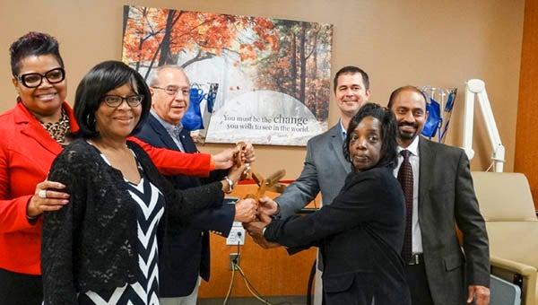DaVita dialysis center ribbon cutting put on by the Franklin-Southampton Area Chamber of Commerce, took place on Tuesday night. Pictured are Treavce Whitmore, Rosetta Mcclean, Dr. Bankuru, Robin Chism, Matt Ferguson and Frank Rabil. -- SUBMITTED | TERESA BEALE