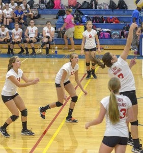 Southampton High's jv volleyball team works together in order to gain another win.