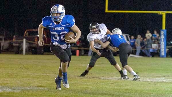 Running back Roy Hill did not score in Southampton Academy’s win over the Community Christian, but had several long runs to spark the Raiders’ offense in the second quarter.  -- Murray Thompson | Tidewater News