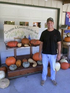 Neil Drake, owner of Grayson and Emma’s Garden Spot in Courtland, works with local farmers to fill his shelves.