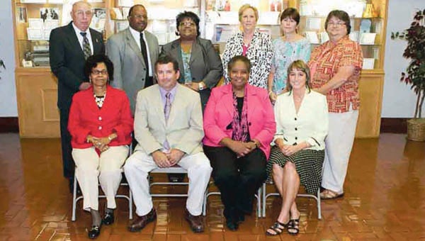Southampton County Public School Board members were recognized by the VSBA for improving their boardmanship skills. Front row, from left, are Florence Reynolds, Vice Chairman Jim Pope, Chairman Dr. Deborah Goodwyn,Denise Bunn; back, William Worsham, Christopher Smith, Superintendent Dr. Alvera J. Parrish, Dr. Carolyn Modlin, Donna Roundtree and Lynn Bradley. -- Courtesy