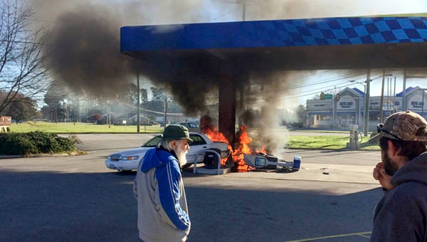 Ian McNett of Franklin accidentally backed his car into a gas pump causing a fire to ignite at Sunoco on Armory Drive on Sunday morning. -- SUBMITTED | CARLTON CUTCHIN