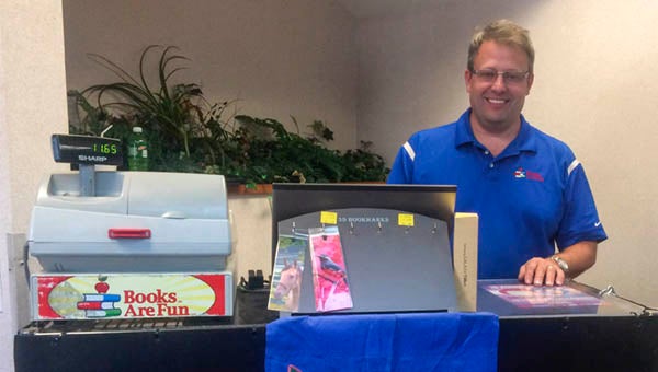 Michael Crawford, representative of Books are Fun!, at Southampton Memorial Hospital on Wednesday selling some of the company’s products. - Rebecca Chappell | Tidewater News