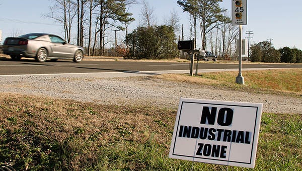 These “No Industrial  Zone” signs are posted along Camp Parkway to show opposition for a proposed development, though not all residents are against the project. -- Andrew Lind | Tidewater News